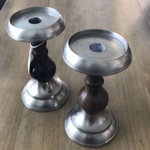 Set of Two Iron Candlesticks.